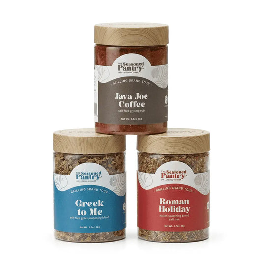 Three jars of 'The Seasoned Pantry' seasoning blends on a white background